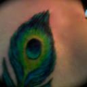 blog logo of Girl With The Peacock Tattoo